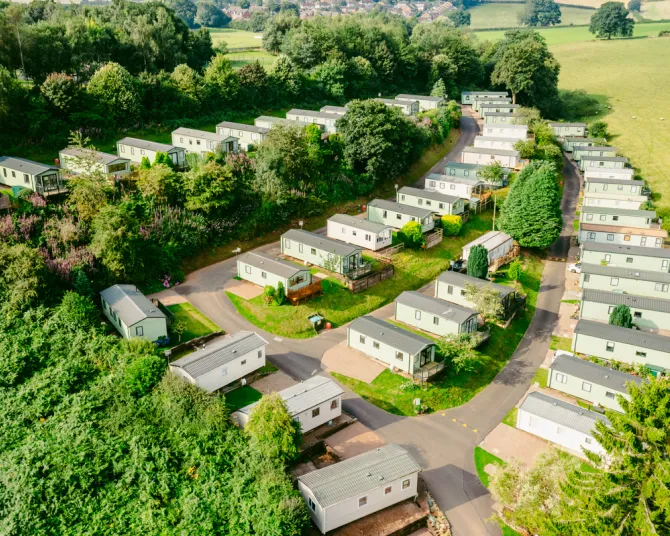 Rows of static caravans on a coastal holiday park